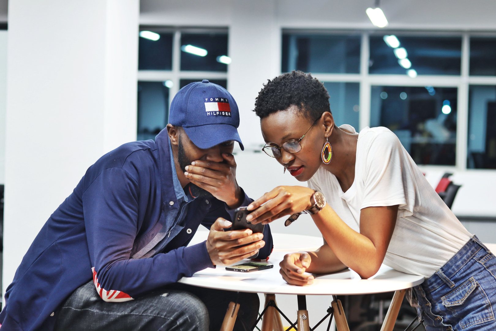 A small business owner at work with a partner